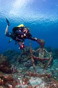 Diver with Neptune statue, Westpunt, Curaçao